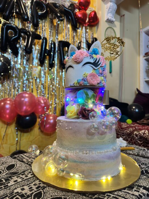 3 tier unicorn themed cake